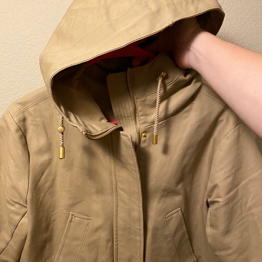 Beige with gold hardware coat